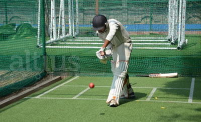 playing cricket in synthetic pitch