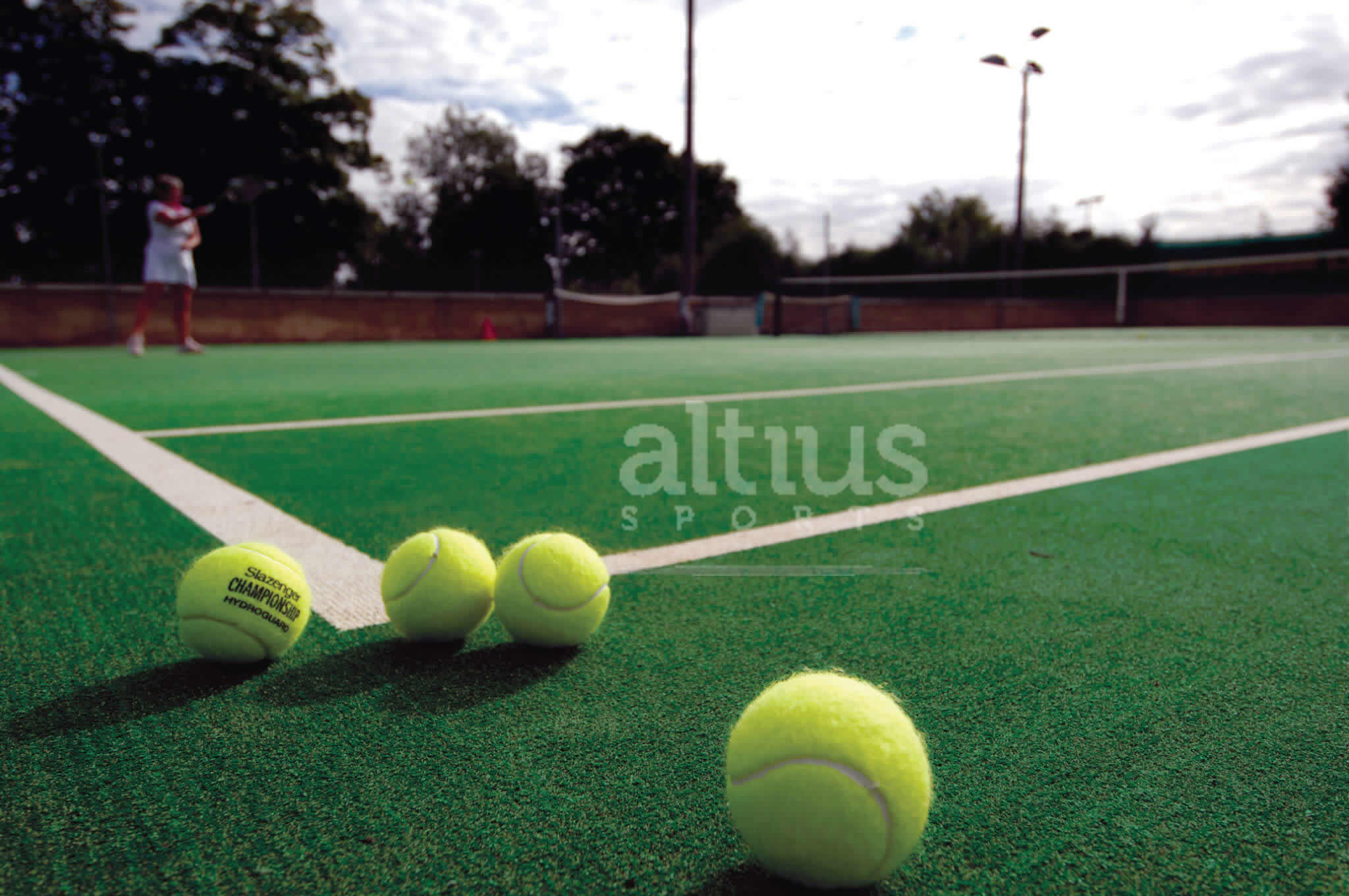 A durable and low maintenance tennis and multi-sport surface 